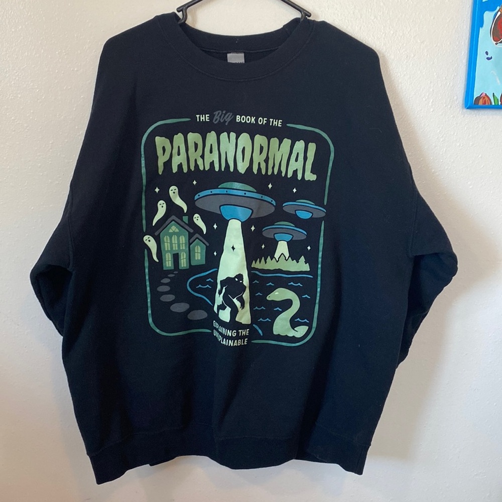 Wicked brand, big book of paranormal long sleeve pullover sweater.